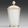 A BALTIC 18TH CENTURY PARCEL-GILT BEAKER AND COVER