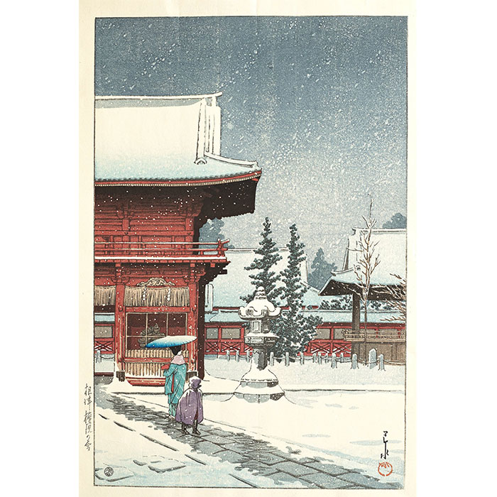 Snöig dag vid Nezu Gongen tempeln i Tokyo